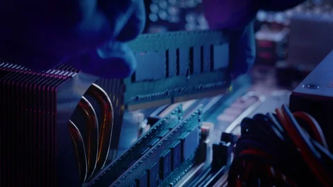 Close-up Moving Macro Shot: Gloved Hand Installs RAM Memory into Computer Mother Stock Footage 121797103