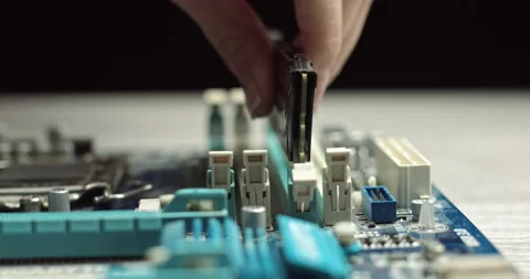 Close-up Moving Macro Shot: Inside of the Computer Case. Camera Moves Over PCB Stock Footage 144949311