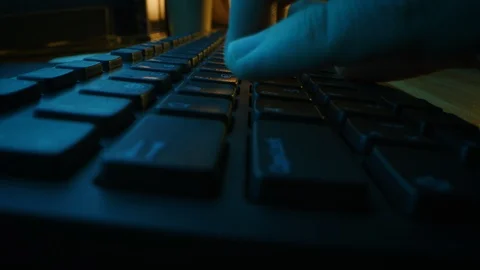 Close-up Moving Macro Shot: Person Typing on the Computer Keyboard finishing Stock Footage 121796749