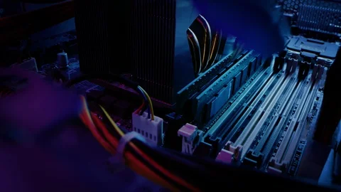 Close-up Moving Macro Shot: Person's Hands Installs RAM Memory into Computer Stock Footage 121797069