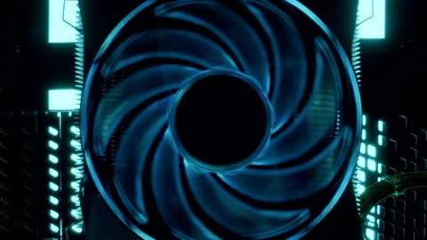 Close-up moving macro shot of the spinning glowing cooler in gaming computer 库存影片 202654246