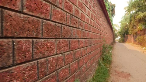 Close moving shot of modern brick wall, Red color brick wall footage Stock-Footage 151966967
