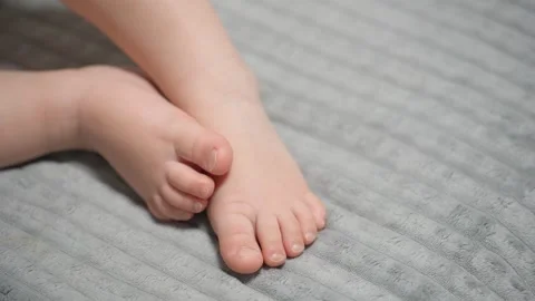 Close up of moving small baby's feet Video stock 301406535