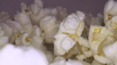 Close up moving through a bowl of popcorn. Stock Footage 130835699
