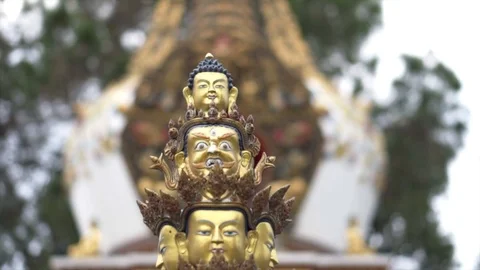 Close up moving towards shot of multi headed buddha statue at temple in Nepal Video stock 91135948