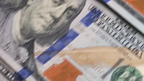 Close-up moving us dollar bills Stock Footage 221188071