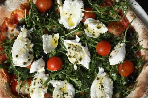 Close up on mozzarella cherry tomato pizzza Stock Photos
