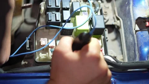 Close-up of multi colored fuses and relays inside fuse box. Stock-Footage 345913579
