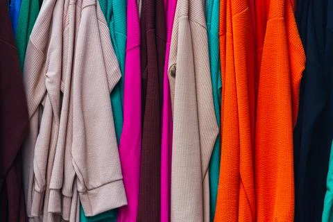 Close-up of multi-colored towels of various sizes in a shop window Stock Photos
