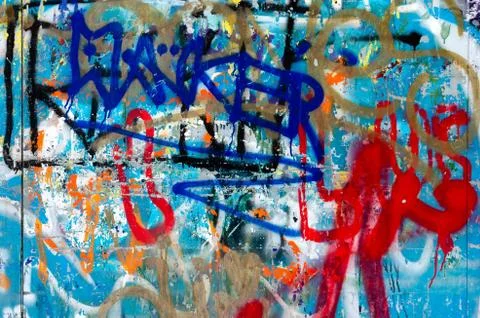 Close-up of a multi- colored vibrant graffiti on wall Stock Photos