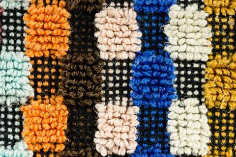 Close-up of a multi coloured detailed structured fabric pattern Stock Photos