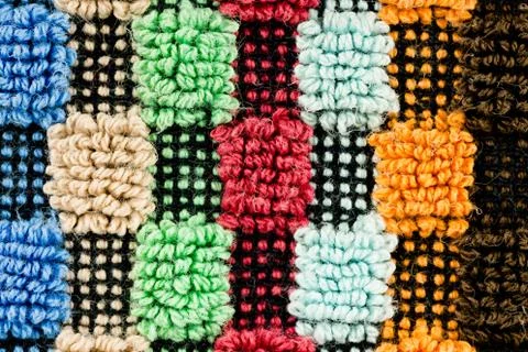 Close-up of a multi coloured detailed structured fabric pattern Stock Photos