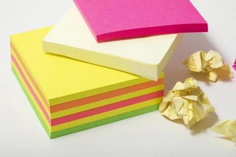 Close up of multi-coloured stack of post it notes Stock Photos