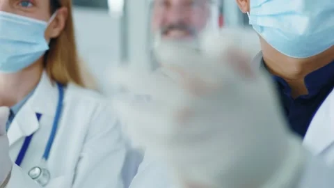 Close-up of multi-national doctors young adults wearing white medical coats Stock Footage 142846165