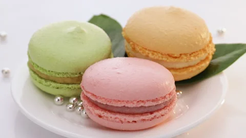 Close up of multicolor macarons , french macaroon, greedy pastry. French dessert Stock Footage 194835473