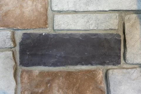 Close-Up of Multicolored Stone Veneer Wall Texture with Natural Masonry Patte Stock Photos