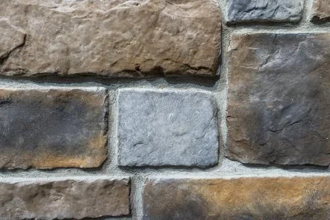 Close-Up of Multicolored Stone Veneer Wall Texture with Natural Masonry Patte Stock Photos