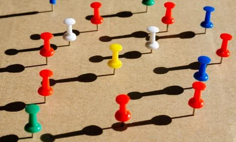 Close-up   of multicolored thumbtack  representative concept regarding divers Stock Photos