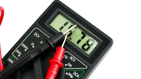 Close-up of a multimeter on a clear surface, highlighting precision and ver.. Stock Footage 261098434