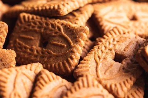 A close up of multiple brown cookies called speculoos or speculaas in Belgi.. Stock Photos