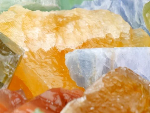 Close-up multiple colored calcite rotating Stock Footage 72983019