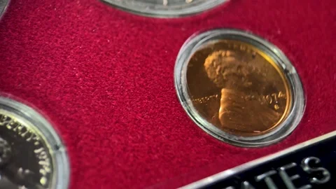 Close-Up of Multiple Denominations in United States Proof Coin Set Video stock 335668144