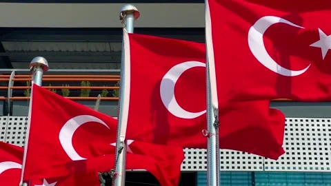 Close up of multiple Turkish flags waving in public park of Istanbul Stock Footage 346541610