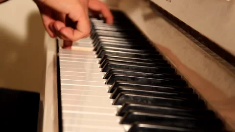 Close-up of a music performer's hand playing the piano Stock Footage 139498846