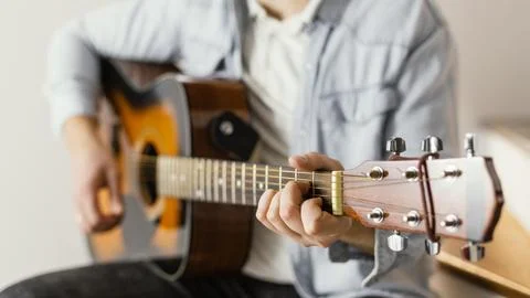 Close up musician playing guitar Stock Photos