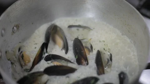 Close up of Mussels Cooking Stock Footage 129338103