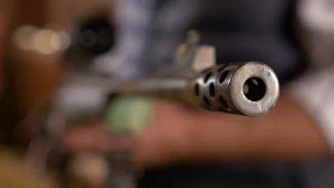 Close-up of the muzzle brake and barrel of a hunting rifle Stock Footage 329164687
