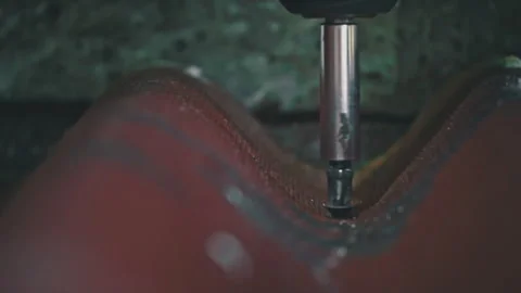 Close-up of a Nail Being Tightened with a Screwdriver in Slow Motion Stock Footage 252175302