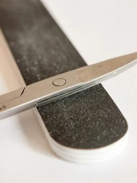 Up close nail file and scissors detail macro Stock Photos