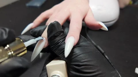 Close-up of Nail Tech Prepping Nails Stock Footage 302198240