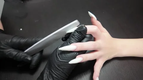 Close-up of Nail Tech Prepping Nails Stock Footage 302198307