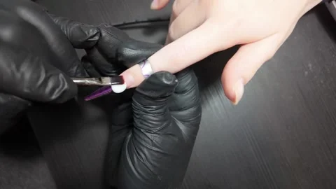 Close-up of Nail Tech Prepping Nails Stock Footage 302198574