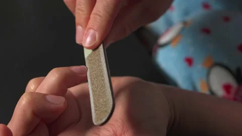 Close-up nails, nail file, manicure treatment. Stock Footage 220320866