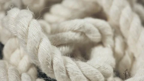 Close up of natural cotton rope. Thick cotton rope showing detail of threads and 動画素材 276891730