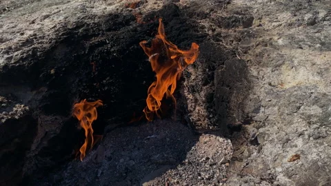 Close Up of Natural Gas Source in Wild Nature from Stones Rock. Chimera Eternal Stock Footage 184038710