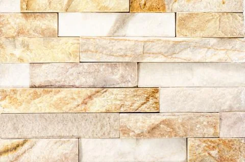 Close-up of Natural River Stone Cladding Mosaic Tile Wall .Old stone facade, Stock Photos
