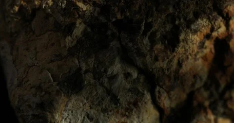 Close-Up of a Natural Weathered Rocky Surface with Rusty Textures Stock Footage 292231297