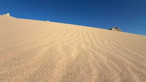 Close Up of Natural Wind Ripple Patterns on Golden Sand Dune Surface in Sahara Stock Footage 341838206