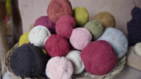 Close up of naturally dyed wool yarn in Chinchero Cusco Peru traditional 動画素材 246256370