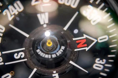 Close up of a naval compass with bokeh Stock Photos