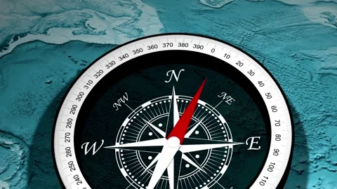 Close-up of navigational compass on blue background. nautical navigation tool Stock Footage 257872664