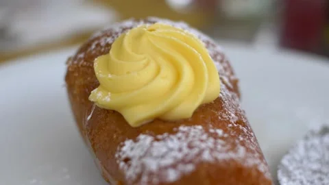 Close up Neapolitan baba with custard. Video 4K Video stock 164445772
