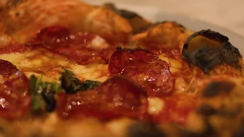 Close Up of Neapolitan Pepperoni Pizza Served on Marble Table Stock Footage 337281277