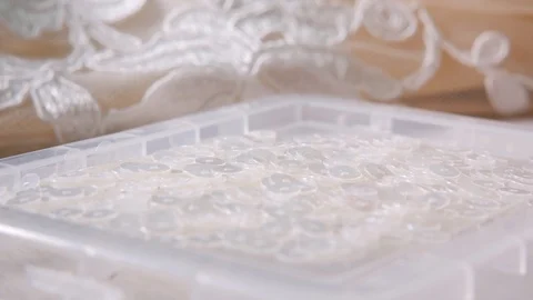 Close-up of needle and thread, embroider pattern. Equipment for sewing elegant Stock Footage 89858892