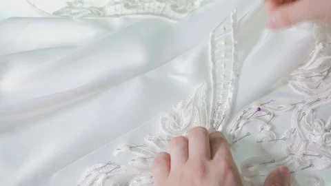 Close-up of needle and thread, embroider pattern. Equipment for sewing elegant Stock Footage 89927829