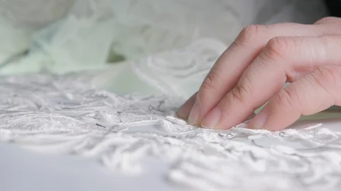 Close-up of needle and thread, embroider pattern. Equipment for sewing elegant Stock Footage 89927979